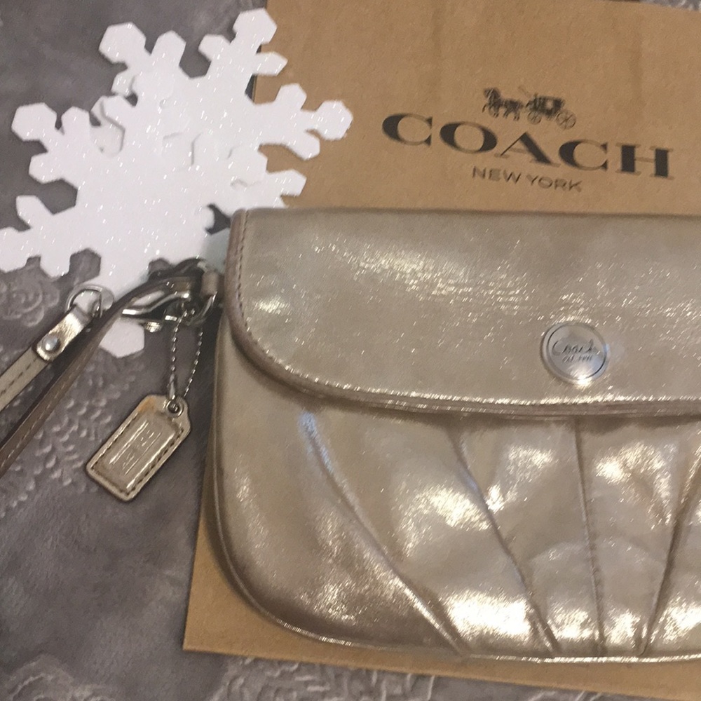 Gold metallic Coach wristlet